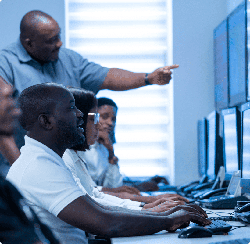 RTCOM Defense staff in aciton, monitoring from the Network Operation centre