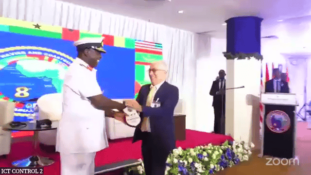 RTCOM Defense MD, Mr Gerard Levy receiving an award from the Nigerian Chief of Naval staff