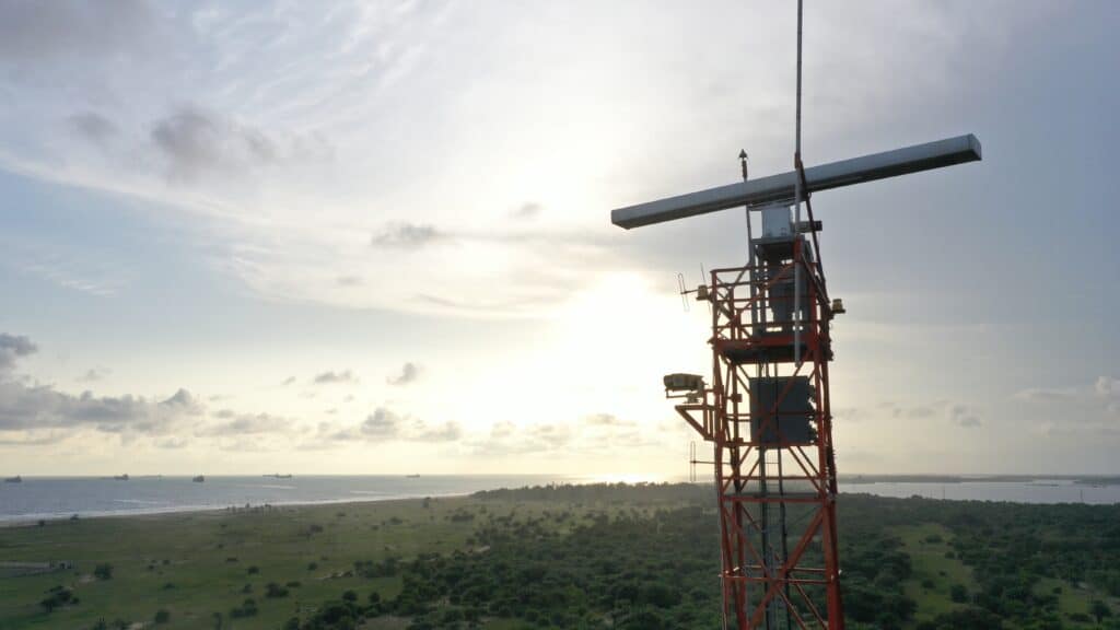 Drone view of an RTCOM Defense Falcon Eye maritime surveillance sensor site used for Total Domain Awareness.