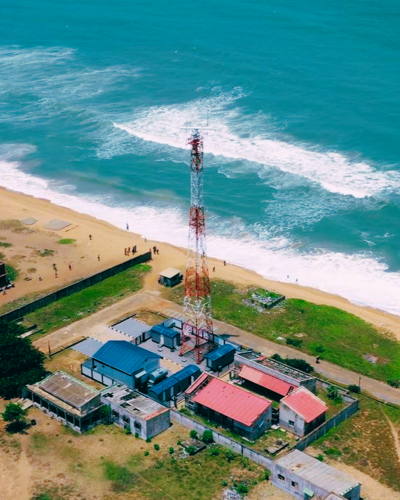 Aerial view of the Nigerian Navy Falcon Eye surveillance tower and command center facility along the Badagry coastline.